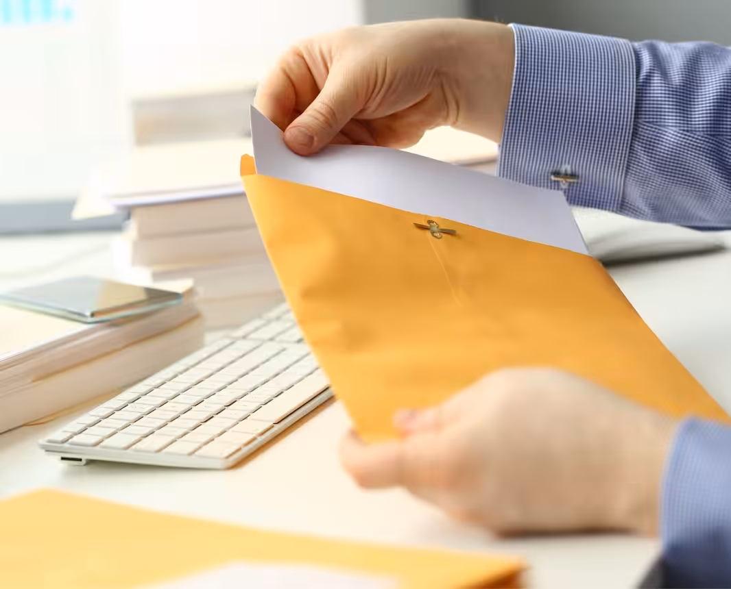 Support specialist handling incoming business documents
