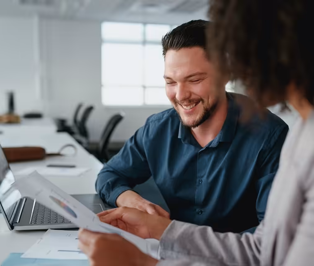 Entrepreneurs discussing business plans in an office