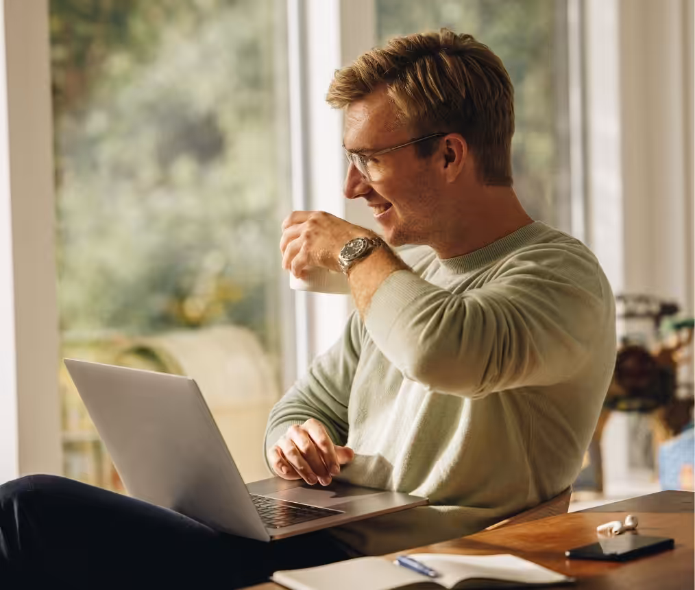 Person starting an LLC online from home on a laptop